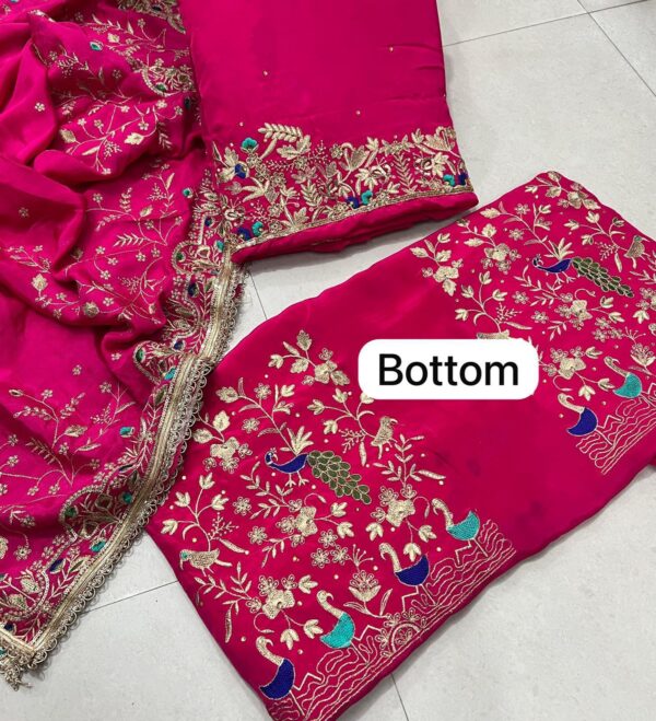 1.	Exquisite Red Embroidered Crepe Suit  Zari & Handwork Embroidery With Chinon Dupatta